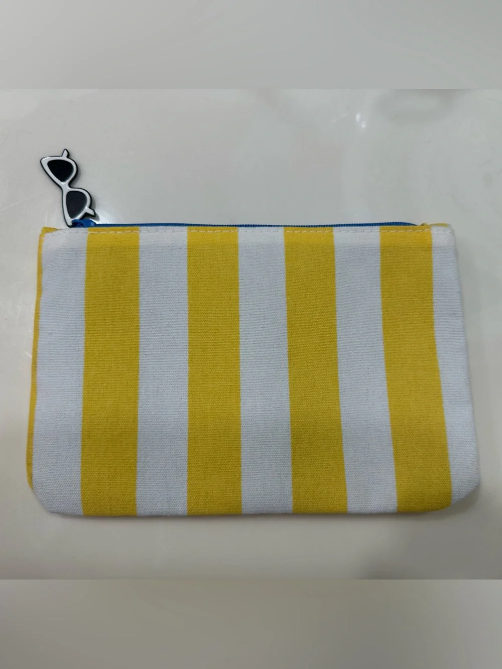 Ipsy yellow and white striped makeup bag with sunglasses zipper pull NWOT